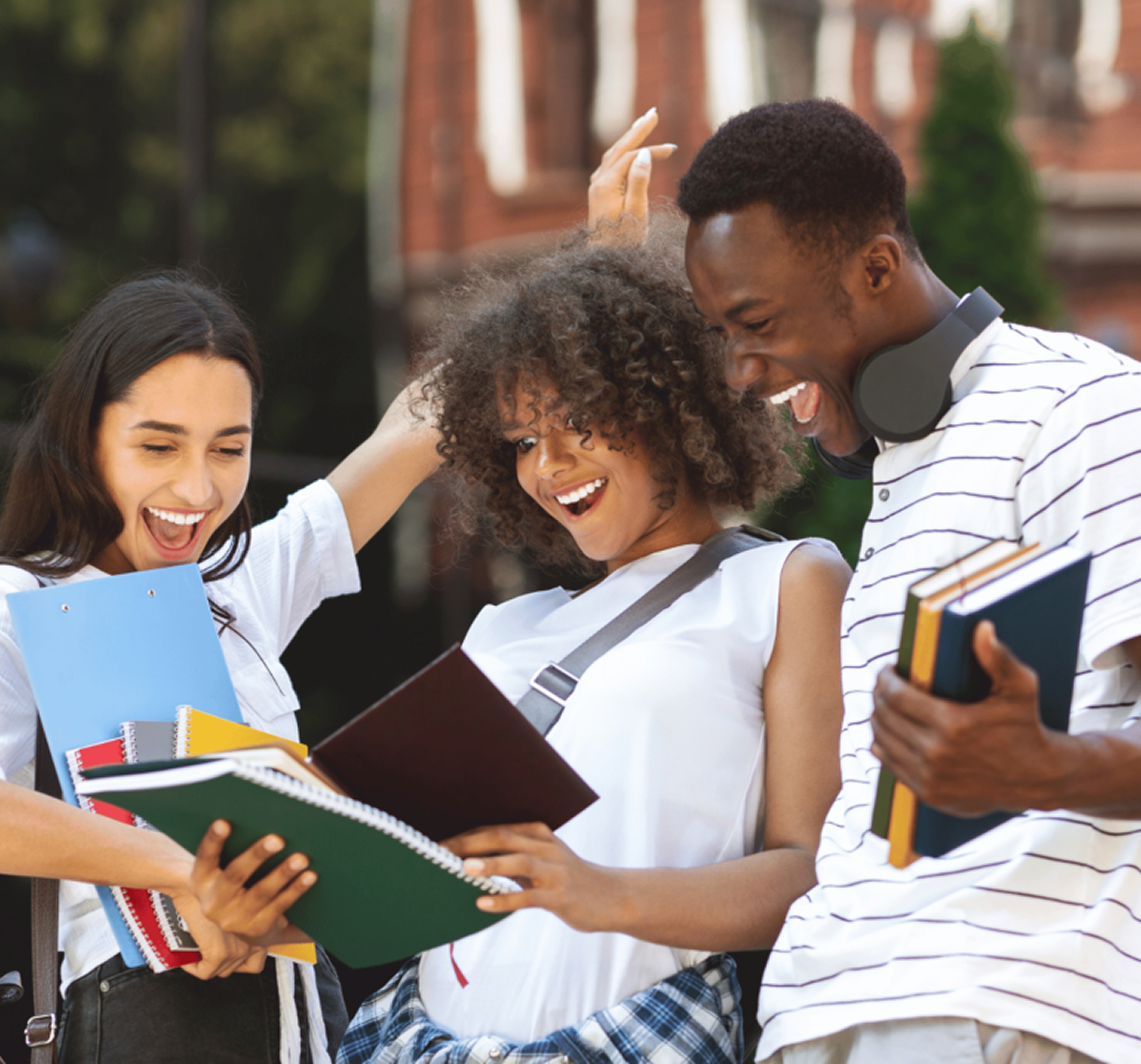 Happy students studying together